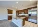 Modern kitchen featuring stainless steel appliances, granite countertops and plenty of cabinet space at 10332 Sweet Laurel St, Las Vegas, NV 89178