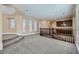Upstairs loft area with a carpet and views of the downstairs at 10332 Sweet Laurel St, Las Vegas, NV 89178