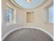 Charming circular nook with carpeting and natural light from three windows at 10332 Sweet Laurel St, Las Vegas, NV 89178