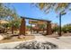 Playground entrance at Mountain's Edge community featuring shaded structures and seating at 10332 Sweet Laurel St, Las Vegas, NV 89178