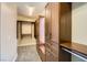 Custom walk-in closet with beautiful wood cabinets and shelving, maximizing storage space at 10332 Sweet Laurel St, Las Vegas, NV 89178
