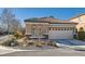 Charming single story home with desert landscaping, two car garage, and tile roof at 1045 Chestnut Chase St, Las Vegas, NV 89138