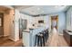Modern kitchen with stainless steel appliances, island with seating, and sleek cabinetry at 1045 Chestnut Chase St, Las Vegas, NV 89138