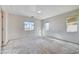 Spacious bedroom with plenty of natural light and dual windows offers ample space for customization at 10505 Cold Mountain Ave, Las Vegas, NV 89129