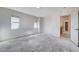 Spacious bedroom featuring dual windows and an open doorway at 10505 Cold Mountain Ave, Las Vegas, NV 89129