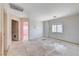 Bright and spacious bedroom area with closet space and windows is ready for customization at 10505 Cold Mountain Ave, Las Vegas, NV 89129