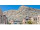 View of the neighborhood with a mountain view in the background at 10505 Cold Mountain Ave, Las Vegas, NV 89129