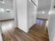 Hallway boasts new floors, fresh paint and lots of sunlight at 10524 India Hawthorn Ave, Las Vegas, NV 89144