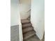 Carpeted staircase with white railings at 11423 Ethereal Landing Ave, Las Vegas, NV 89138