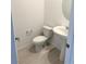 Well-lit half bathroom with a pedestal sink and toilet, ideal for guests at 11443 Ethereal Landing Ave, Las Vegas, NV 89138