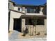 Charming two-story home featuring a balcony, neutral tones, and a well-maintained front yard with tasteful landscaping at 11443 Ethereal Landing Ave, Las Vegas, NV 89138