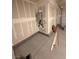An unfinished corner of the garage with water heater at 11443 Ethereal Landing Ave, Las Vegas, NV 89138