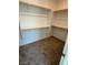 Spacious walk-in closet with shelving and carpeted flooring at 11443 Ethereal Landing Ave, Las Vegas, NV 89138