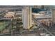 An eye-level shot of a high-rise condo in Las Vegas with a golf range and city in the background at 125 E Harmon Ave # 2521, Las Vegas, NV 89109