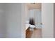 Neutral toned bathroom featuring a shower-tub combination with a tiled enclosure at 173 Betty Ln, Las Vegas, NV 89110