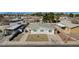 Modest single-story home with desert landscaping and a concrete driveway at 173 Betty Ln, Las Vegas, NV 89110