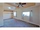 Spacious main bedroom with vaulted ceilings, carpeting, and ample natural light from windows at 173 Betty Ln, Las Vegas, NV 89110
