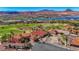 Beautiful home in a golf course community boasting stunning mountain and lake views, as well as a red tile roof at 2 Camino Barcelona Pl, Henderson, NV 89011