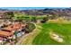 Beautiful estate with a terracotta roof and backyard pool is nestled next to a golf course with desert views at 2 Camino Barcelona Pl, Henderson, NV 89011