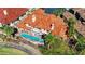 Luxury home with a terracotta roof, backyard pool with a rock feature and meticulously landscaped yard at 2 Camino Barcelona Pl, Henderson, NV 89011