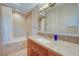 Clean bathroom with granite countertops, vanity, and shower with bathtub at 2 Camino Barcelona Pl, Henderson, NV 89011