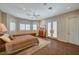 Well-lit bedroom with wood floors, multiple windows, and a built-in bench at 2 Camino Barcelona Pl, Henderson, NV 89011