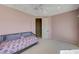 Comfortable bedroom with carpet flooring and access to walk in closet at 2 Camino Barcelona Pl, Henderson, NV 89011