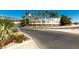 Lake Las Vegas entrance with desert landscaping and a pedestrian bridge overhead at 2 Camino Barcelona Pl, Henderson, NV 89011