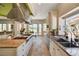 Gourmet kitchen with a large island, stainless steel range hood, and views of the backyard at 2 Camino Barcelona Pl, Henderson, NV 89011