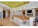 Bright and airy kitchen with a center island, modern appliances, and a unique ceiling design at 2 Camino Barcelona Pl, Henderson, NV 89011