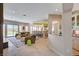 Spacious living room featuring travertine flooring, recessed lighting, and multiple seating areas at 2 Camino Barcelona Pl, Henderson, NV 89011