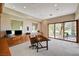 Bright home office with built-in storage and a view of the landscaped yard at 2 Camino Barcelona Pl, Henderson, NV 89011