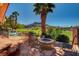 Charming outdoor fire pit area with comfortable seating, perfect for entertaining or relaxing at 2 Camino Barcelona Pl, Henderson, NV 89011