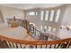 Grand staircase with decorative iron railings and views of the entryway and upper level at 2 Camino Barcelona Pl, Henderson, NV 89011