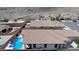 View of a home showing the backyard pool, covered patio, and privacy from neighboring houses at 2351 Thornwood Castle Dr, Laughlin, NV 89029