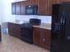 Modern kitchen featuring sleek appliances and granite countertops for gourmet cooking at 2351 Thornwood Castle Dr, Laughlin, NV 89029