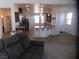 Spacious open-concept living room and kitchen with contemporary finishes at 2351 Thornwood Castle Dr, Laughlin, NV 89029