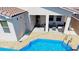 Inviting backyard with pool, covered patio, and plenty of space for outdoor living at 2351 Thornwood Castle Dr, Laughlin, NV 89029