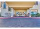 The welcoming entrance features covered seating and elegant architectural details at 2455 W Serene Ave # 603, Las Vegas, NV 89123