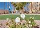 Exterior view of flower garden and lawn area, and trees on well-maintained grounds at 2455 W Serene Ave # 603, Las Vegas, NV 89123