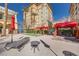Outdoor area featuring shaded lounge areas, perfect for relaxation and socializing at 2455 W Serene Ave # 603, Las Vegas, NV 89123