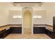 Elegant bathroom featuring dual vanities, granite countertops, and decorative tile accents at 2600 Cervino Cir, Henderson, NV 89052