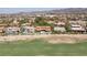 Beautiful exterior shot of a house overlooking the pristine green golf course at 2600 Cervino Cir, Henderson, NV 89052