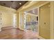 Hallway featuring wood floors, elegant railing, and views of the second story at 2600 Cervino Cir, Henderson, NV 89052