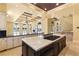 Spacious kitchen with an island, granite countertops, and an open layout at 2600 Cervino Cir, Henderson, NV 89052