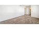 Bright bedroom features a neutral carpet, closet and white painted walls at 2667 Aracatuba Ave, Las Vegas, NV 89121
