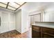 Spacious kitchen with ample storage, featuring wood cabinets and access to a backyard patio at 2667 Aracatuba Ave, Las Vegas, NV 89121