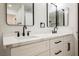 Modern bathroom featuring double sinks, sleek fixtures, and a bright, clean aesthetic at 2925 Wigwam Pkwy # 923, Henderson, NV 89074
