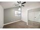 Bedroom with neutral carpet, window, and mirrored closet at 2925 Wigwam Pkwy # 923, Henderson, NV 89074