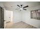 Bedroom featuring wood-look floors, a ceiling fan, and natural light at 2925 Wigwam Pkwy # 923, Henderson, NV 89074